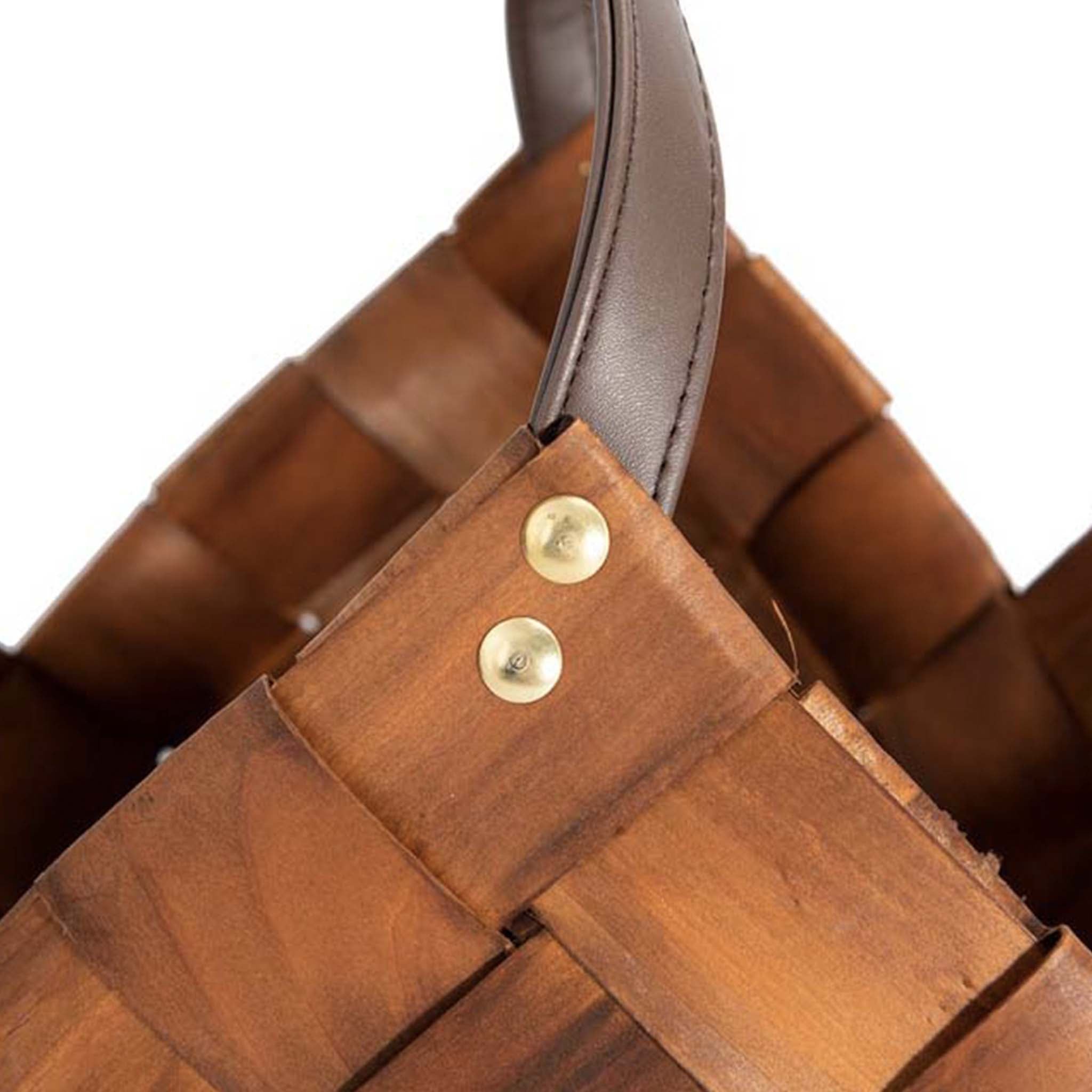 Close up of brown rectangular woven baskets with leather handle