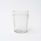 Hand blown juice glass on a white background