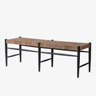 'Wyatt' Bench with leather strapped seat and black legs by four hands furniture on a white background