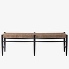 'Wyatt' Bench with leather strapped seat and black legs by four hands furniture on a white background